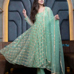 Green and gold-toned embroidered semi-stitched dress material